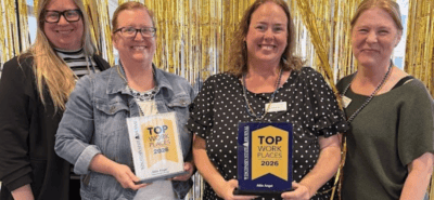 women of Attic Angel holding awards